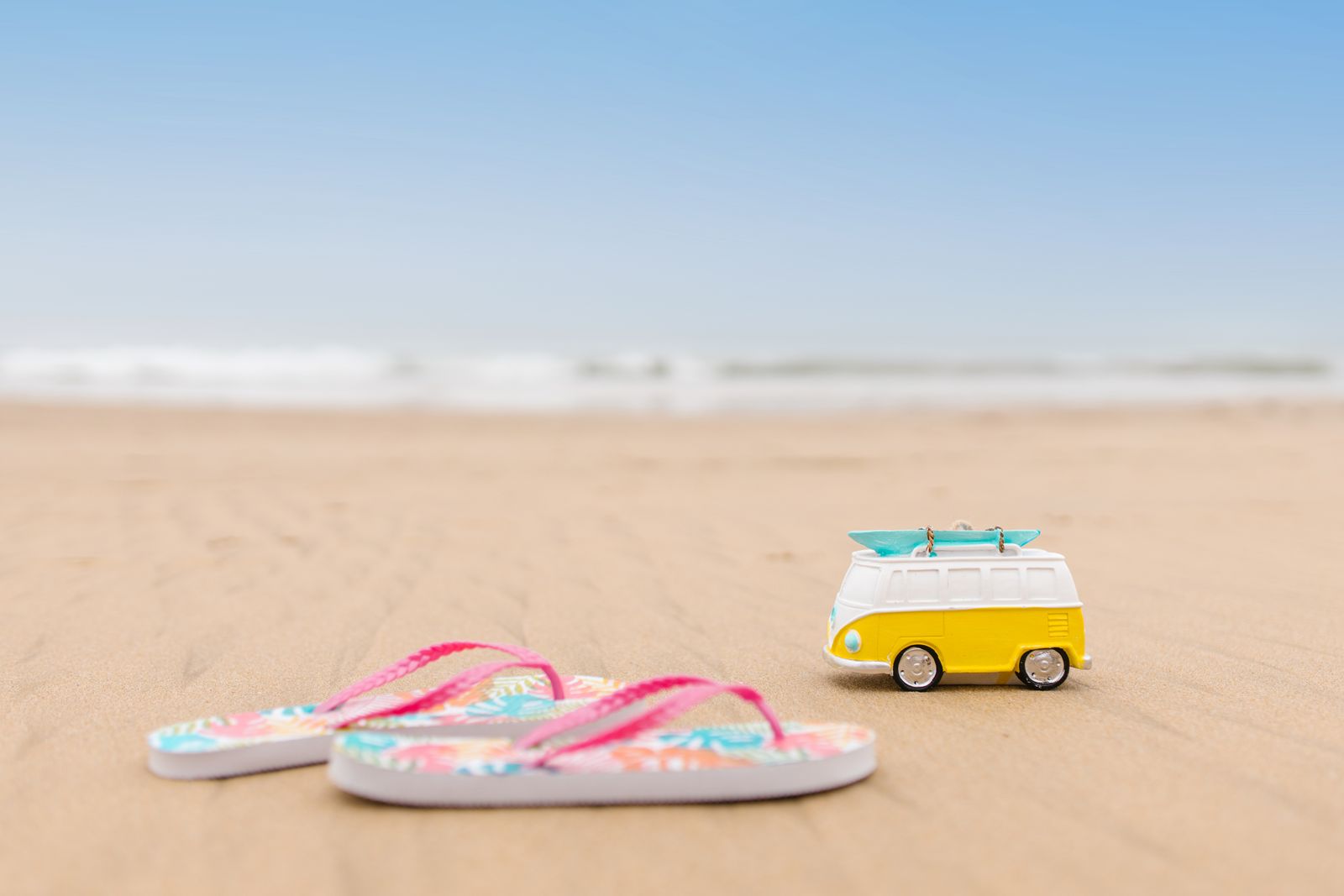 Family loading a car for a beach trip